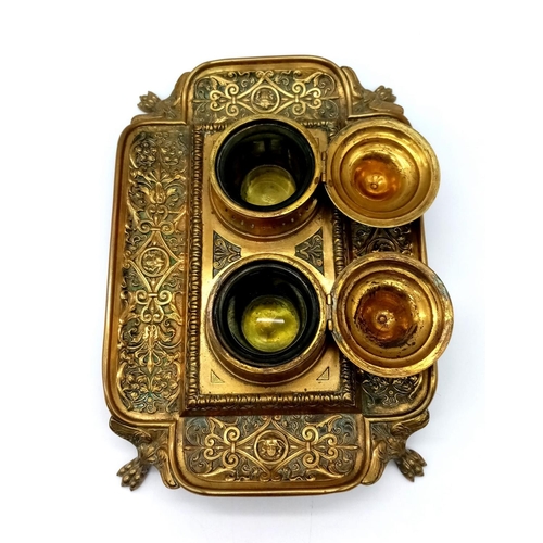 1615 - An Antique Brass (Possibly French) Double Inkwell. Ornate regal scroll decoration throughout with tw... 