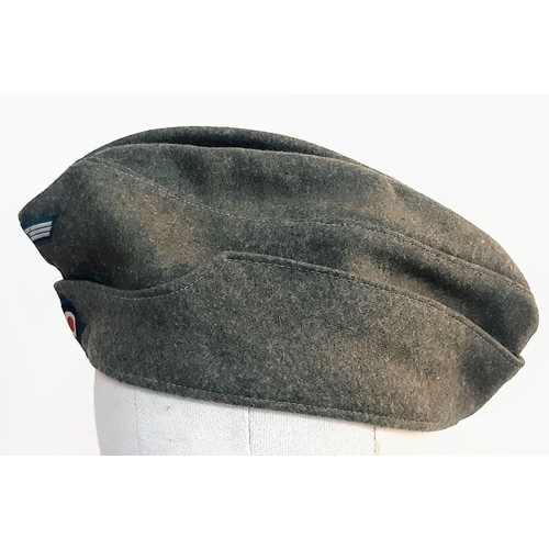 125 - WW2 German Heer (Army) M34 Overseas Side Cap. Good condition for its age.