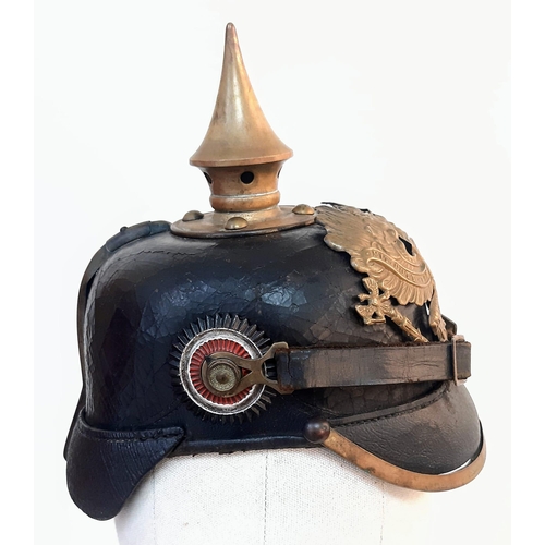 90 - WW1 1895 Model Imperial German Pickelhaube with chinstrap and cockles. Unit marked to the 70th
(Rhen... 