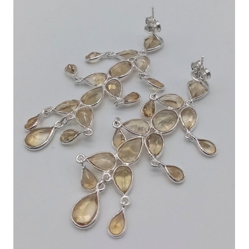 1013 - A fabulous pair of 925 silver cluster Lemon Quartz drop earrings (7cm drop). Total weight 9.8G.