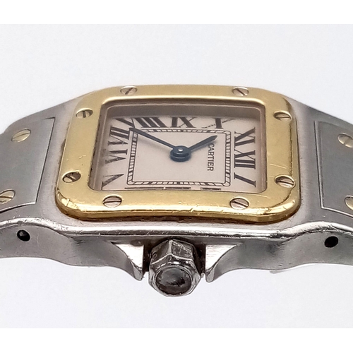 102 - A Cartier Bi-Metal Santos Quartz Ladies Watch. Stainless steel bracelet with gold screws. Bi-metal c... 