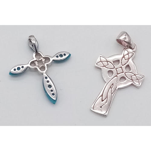 1128 - A STERLING SILVER TURQUISE STONE SET CROSS AND A SILVER CROSS CHARM/PENDANT 6.1G

ref: SC 3138