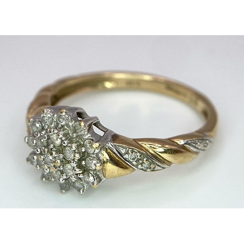 124 - A 9K YELLOW GOLD 0.25CT DIAMOND CLUSTER RING. TOTAL WEIGHT 2.7G. SIZE Q