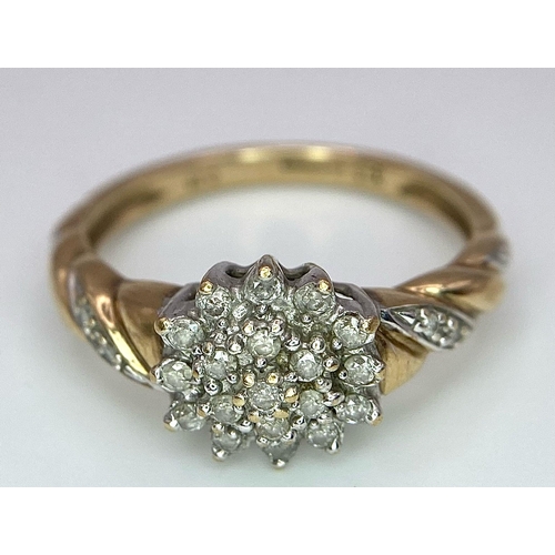 124 - A 9K YELLOW GOLD 0.25CT DIAMOND CLUSTER RING. TOTAL WEIGHT 2.7G. SIZE Q