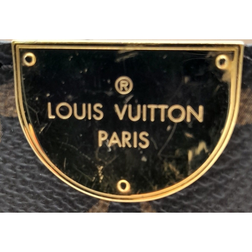 127 - A Louis Vuitton Monogram Flandrin Handbag. Leather exterior with gold-toned hardware, two rolled lea... 