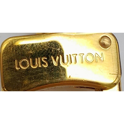 127 - A Louis Vuitton Monogram Flandrin Handbag. Leather exterior with gold-toned hardware, two rolled lea... 