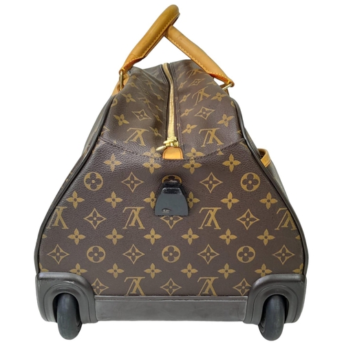 134 - A Louis Vuitton Monogram Eole Convertible Travel Bag. Leather exterior with gold-toned hardware, lug... 