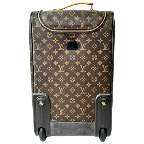 134 - A Louis Vuitton Monogram Eole Convertible Travel Bag. Leather exterior with gold-toned hardware, lug... 