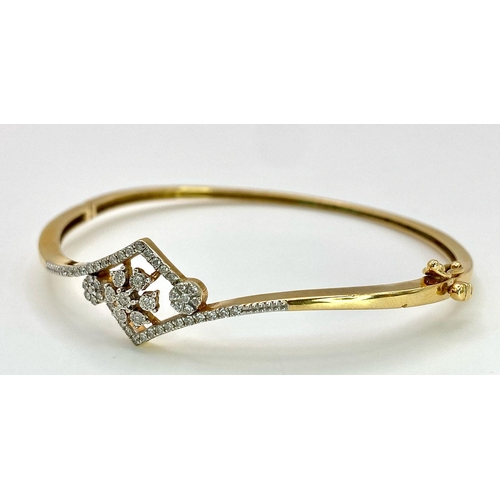 159 - A 18K YELLOW GOLD 0.32CT  DIAMOND SET BANGLE. TOTAL WEIGHT 11G