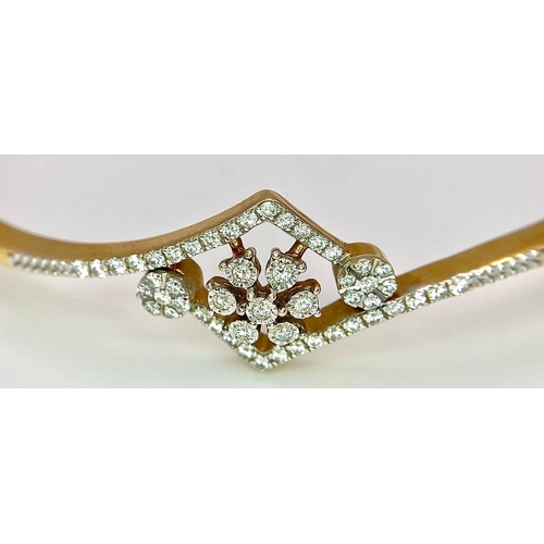 159 - A 18K YELLOW GOLD 0.32CT  DIAMOND SET BANGLE. TOTAL WEIGHT 11G