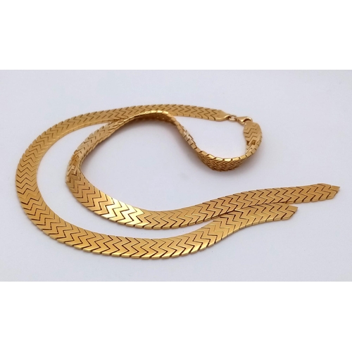 16 - An Elegant 18K Gold Flat Scale Link Necklace with Twin Tassel Extenders. 48cm length. 35.25g weight.