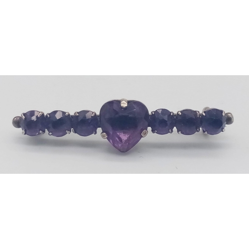 1708 - An antique sterling silver faceted Amethyst brooch with Heart shape centre. Full hallmarks Chester, ... 