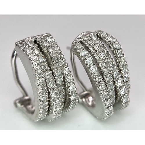 180 - A PAIR OF 18K WHITE GOLD DIAMOND EARRINGS. TOTAL WEIGHT 9.8G