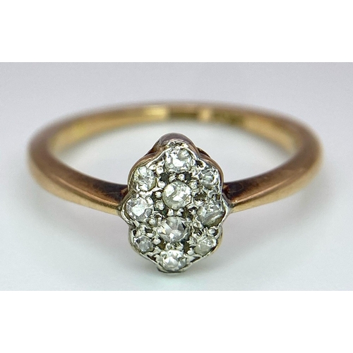 228 - A VINTAGE 18K YELLOW GOLD & PLATINUM OLD CUT 0.30CT DIAMOND CLUSTER RING. TOTAL WEIGHT 2.8G. SIZE N