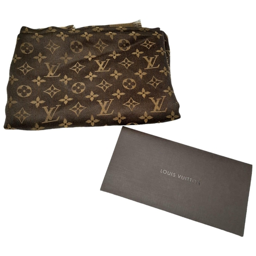 234 - A Louis Vuitton Châle Monogram Shine Silk Scarf. Comes with purchase receipt. Approximately 140cm x ... 