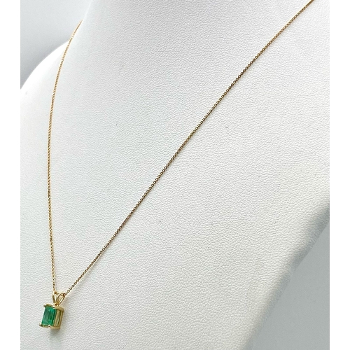 268 - An 18K Yellow Gold Emerald Pendant on an 18K Gold Disappearing Necklace. 10mm and 40cm. 1.35g total ... 