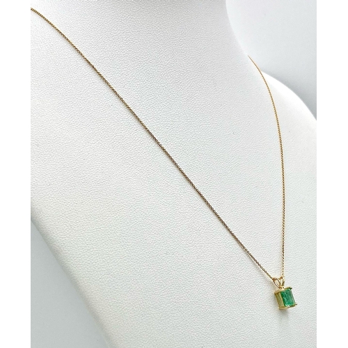 268 - An 18K Yellow Gold Emerald Pendant on an 18K Gold Disappearing Necklace. 10mm and 40cm. 1.35g total ... 