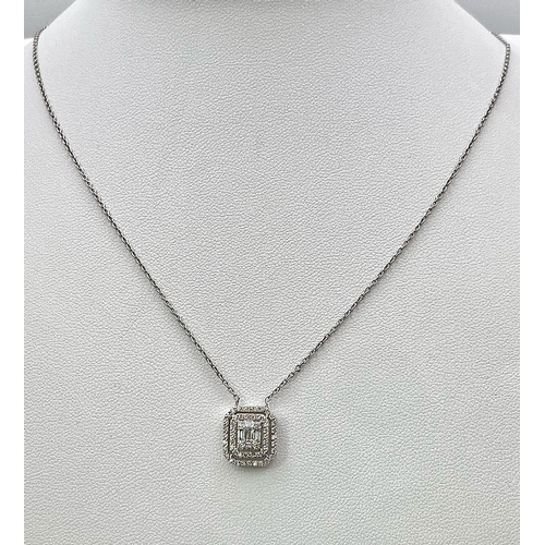 282 - A 18K WHITE GOLD 0.60CT DIAMOND SET PENDANT ON CHAIN. TOTAL WEIGHT 3.7G