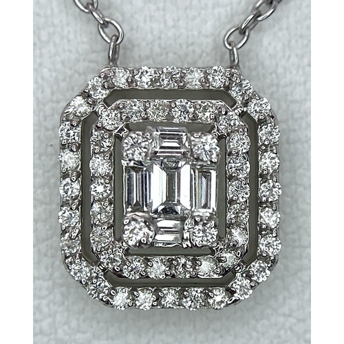 282 - A 18K WHITE GOLD 0.60CT DIAMOND SET PENDANT ON CHAIN. TOTAL WEIGHT 3.7G