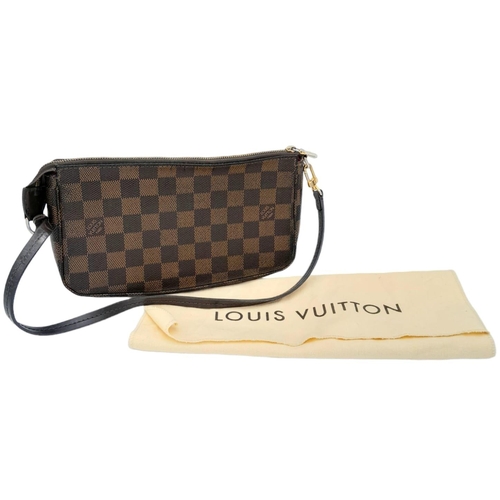 361 - A Louis Vuitton Damier Ebene Pochette with Leather Exterior. Top Zip Closure. Red Fabric Lining with... 