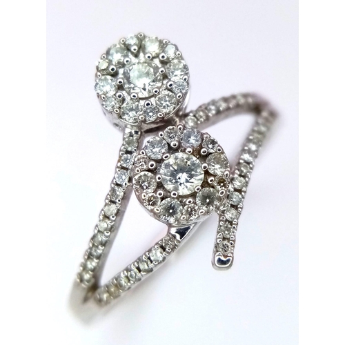 362 - A 14K WHITE GOLD 0.36CT  DIAMOND DOUBLE CLUSTER RING. TOTAL WEIGHT 2.7G. SIZE N