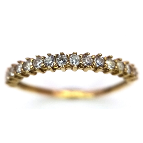 393 - An 18K Yellow Gold Diamond Half Eternity Ring. Size N. 1.32g total weight.