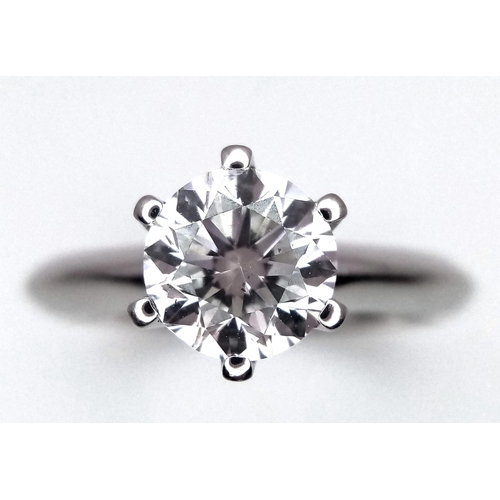 43 - An 18K white Gold 1ct Diamond Solitaire Ring. Brilliant round cut diamond. Comes with an IGI certifi... 