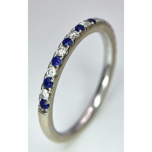 436 - A 14ct white gold diamond and sapphire half eternity ring, set with 9 diamonds and 10 sapphires, 1.7... 