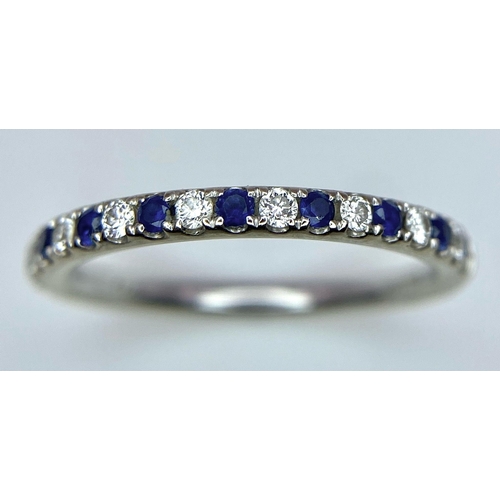 436 - A 14ct white gold diamond and sapphire half eternity ring, set with 9 diamonds and 10 sapphires, 1.7... 