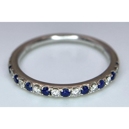 436 - A 14ct white gold diamond and sapphire half eternity ring, set with 9 diamonds and 10 sapphires, 1.7... 