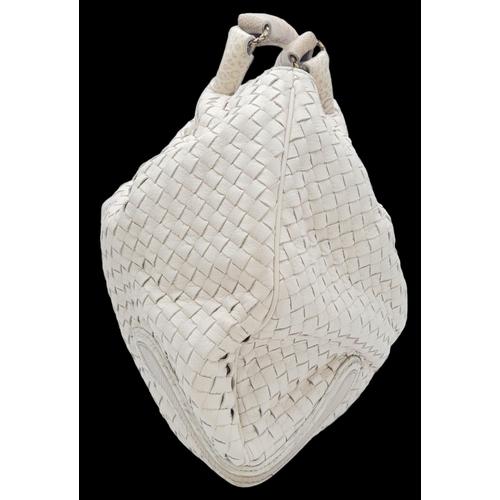 67 - A Bottega Veneta Cream Hobo Bag. Intracciato (woven) leather exterior with reptilian handles and bro... 