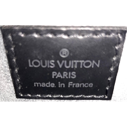 81 - A Louis Vuitton Black 'Jasmin' Handbag. Epi leather exterior with gold-toned hardware, two rolled le... 