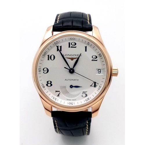 86 - A Glorious Longine 18K Rose Gold Automatic Gents Watch. Black Alligator leather strap. 18K rose gold... 