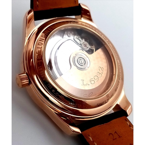 86 - A Glorious Longine 18K Rose Gold Automatic Gents Watch. Black Alligator leather strap. 18K rose gold... 