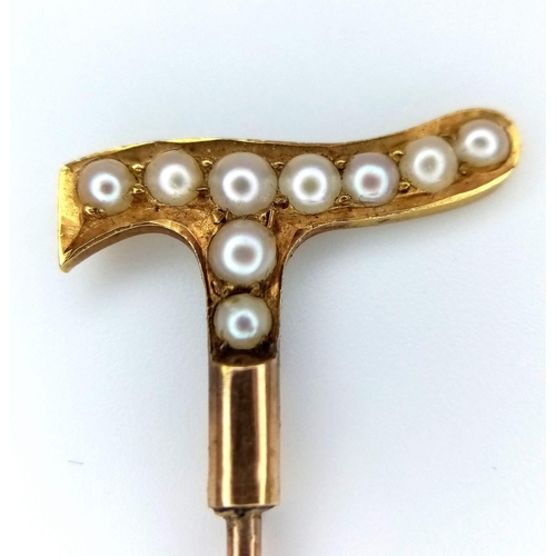 865 - An Antique 9K Yellow Gold and Seed Pearl Stick Pin in the Form of a Walking Stick. 6.5cm length. 2.0... 