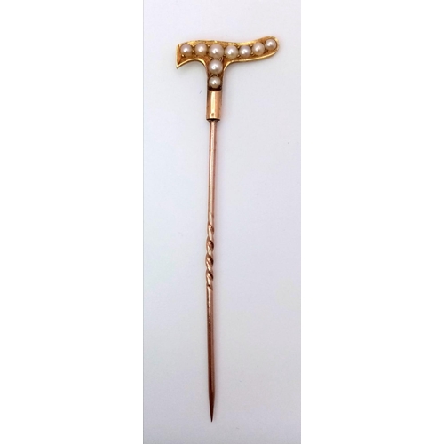 865 - An Antique 9K Yellow Gold and Seed Pearl Stick Pin in the Form of a Walking Stick. 6.5cm length. 2.0... 