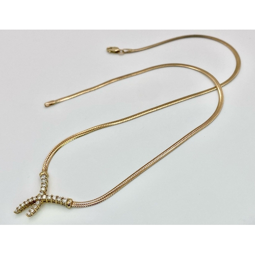 107 - A 9K Yellow Gold Herringbone Necklace with an Attached Eternal Crossover Diamond Pendant. 40cm neckl... 