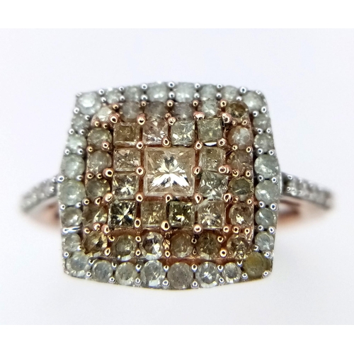 131 - A FANCY 9K ROSE GOLD 0.60CT DIAMOND CLUSTER RING. TOTAL WEIGHT 2.1G. SIZE L 1/2