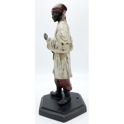 143 - An Antique Cold Painted Bronze Character Statue. A Chinese scholar teaches his students. 37cm tall.