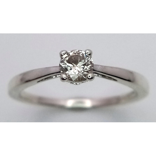 345 - A 9K WHITE GOLD 0.30CT DIAMOND SOLITAIRE RING. TOTAL WEIGHT 2G. SIZE M