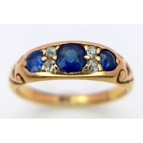 359 - A 18K YELLOW GOLD DIMAOND & SAPPHIRE RING. TOTAL WEIGHT 3.4G. SIZE M