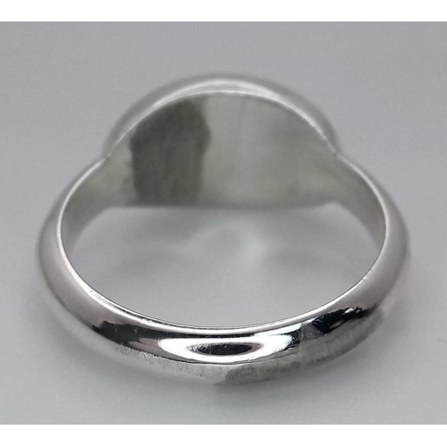 48 - A Please Return to Tiffany & Co. Silver Signet Ring. Comes with a Tiffany pouch. Size O. Ref: 016081