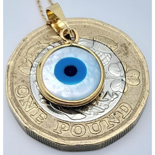 309 - An Evil Eye 18k Gold Pendant on an 18K Gold Disappearing Necklace. 20mm and 44cm. 1.85g total weight... 