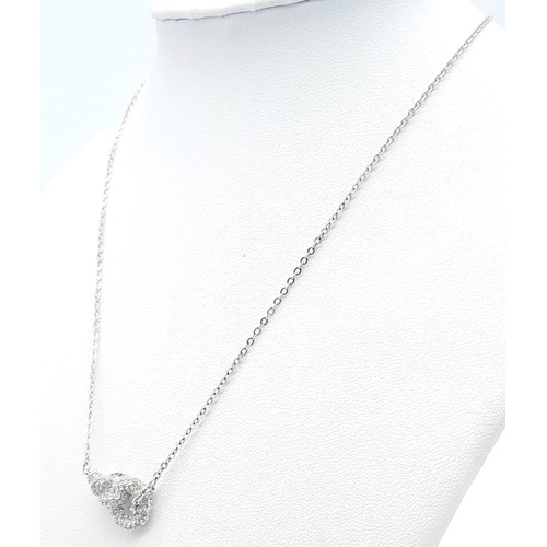 1189 - A SWAROVSKI CRYSTAL NECKLACE. TOTAL WEIGHT 4.45G. TOTAL LENGTH 39CM.