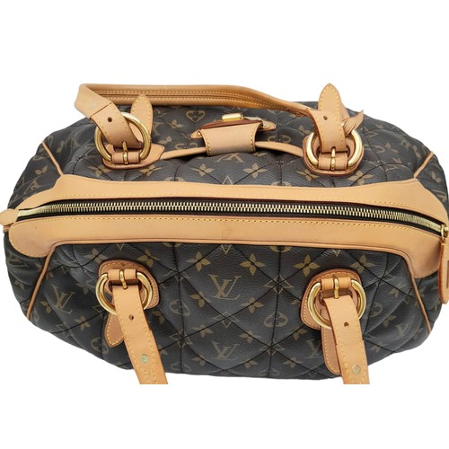 31 - A Louis Vuitton Monogram Etoile Bowling Bag. Quilted leather exterior with gold-toned hardware, padl... 