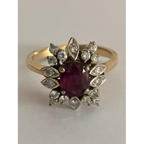 105 - 14 carat YELLOW GOLD,DIAMOND and RUBY RING. Having an oval cut Ruby to centre with full Diamond surr... 