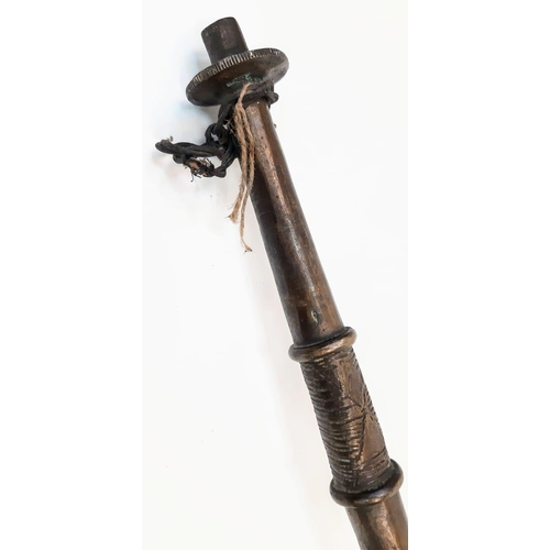 225 - An Antique Bronze Two-Piece Pipe. Gothic, almost Satanic Decorative Base. 66cm length.