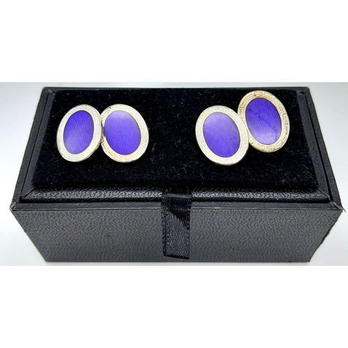 325 - A Pair of Stylish Vintage Blue Enamel and 9K White Gold Cufflinks. 10.48g total weight.