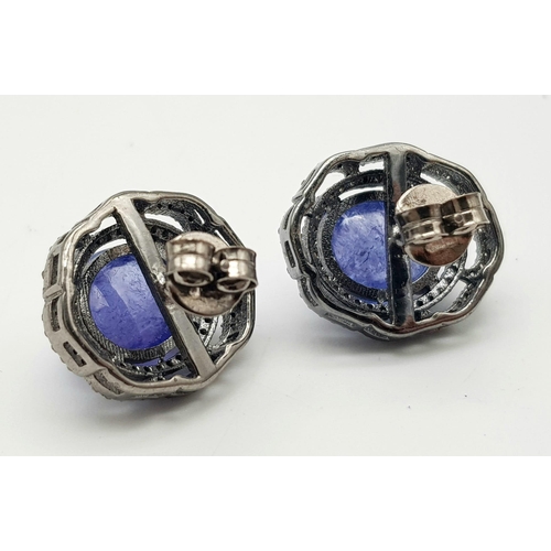 331 - A Pair of Pale Blue Tanzanite Cabochon Gemstone Earrings with Diamond Surrounds set in 925 Silver. T... 