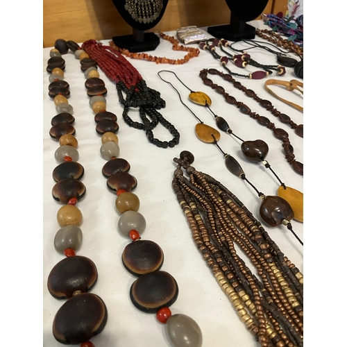 595 - Large Selection of Jewellery in natural materials to include wood and wooden combinations. Please se... 